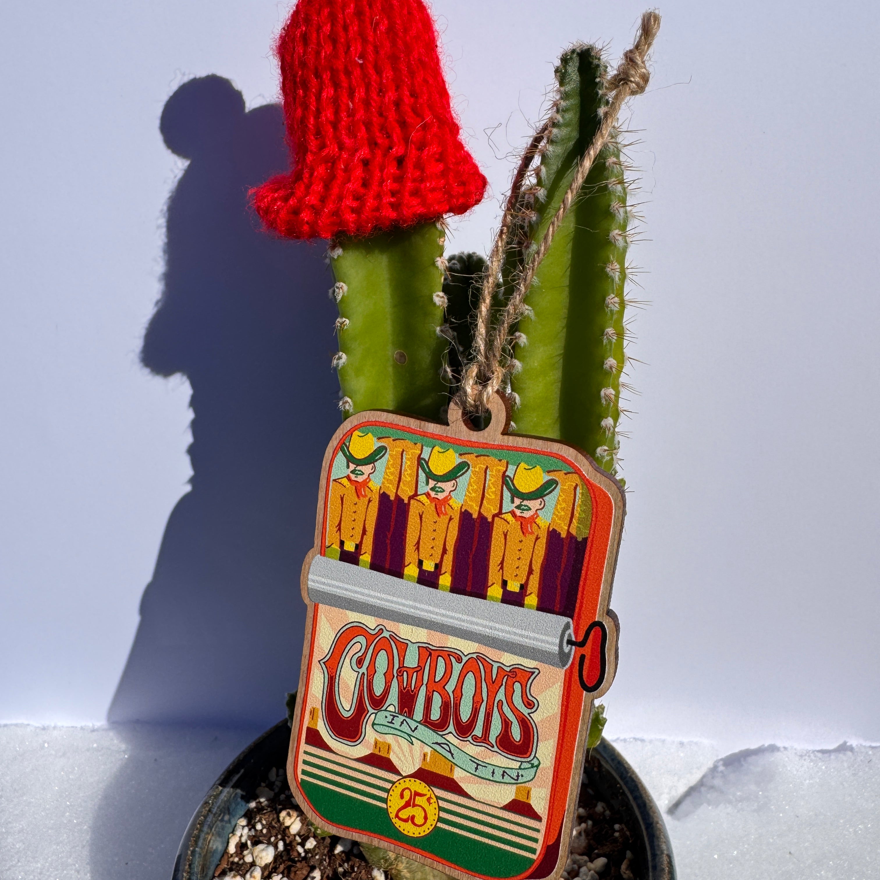 Cowboys in a Tin Ornament