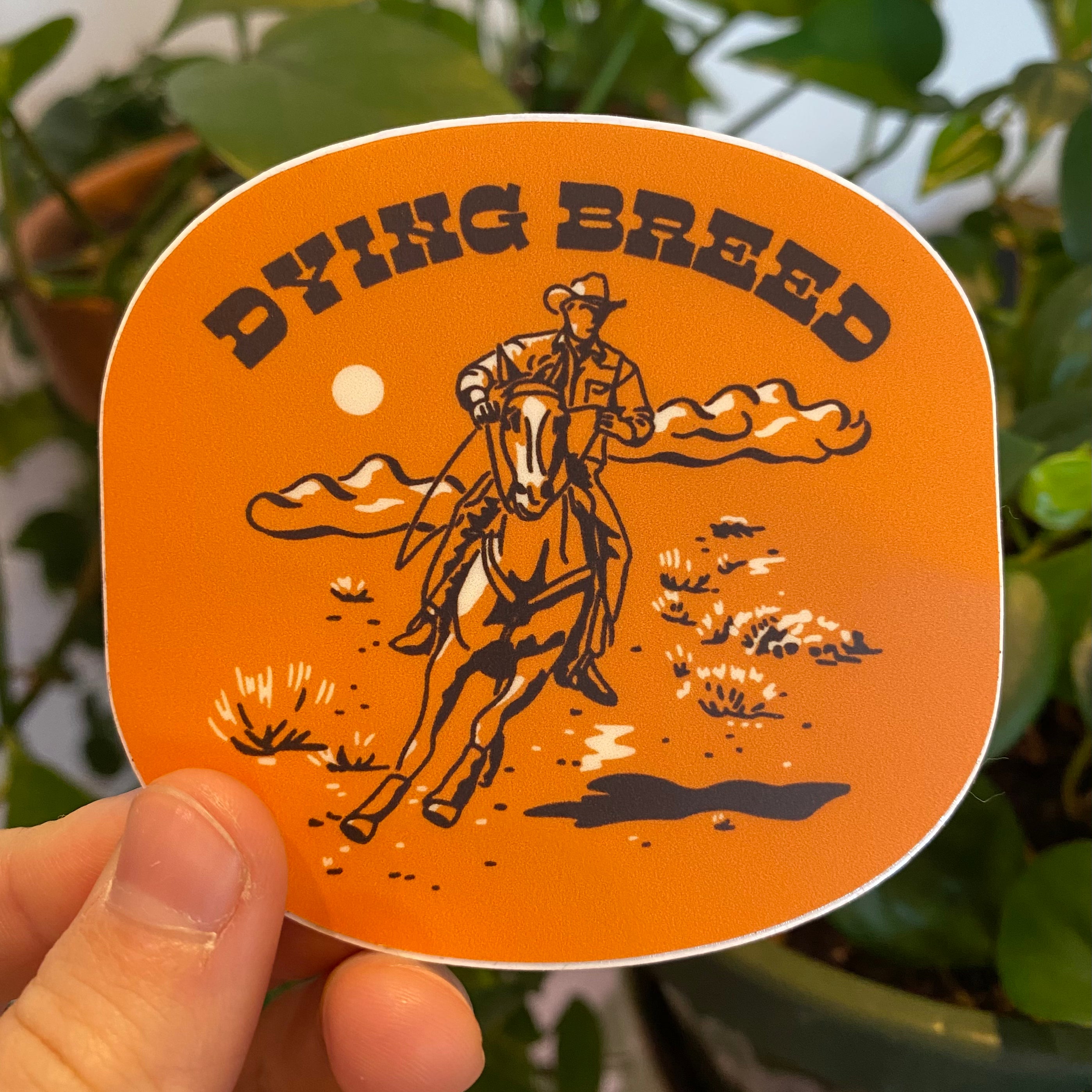 Dying Breed Orange Cowboy Sticker