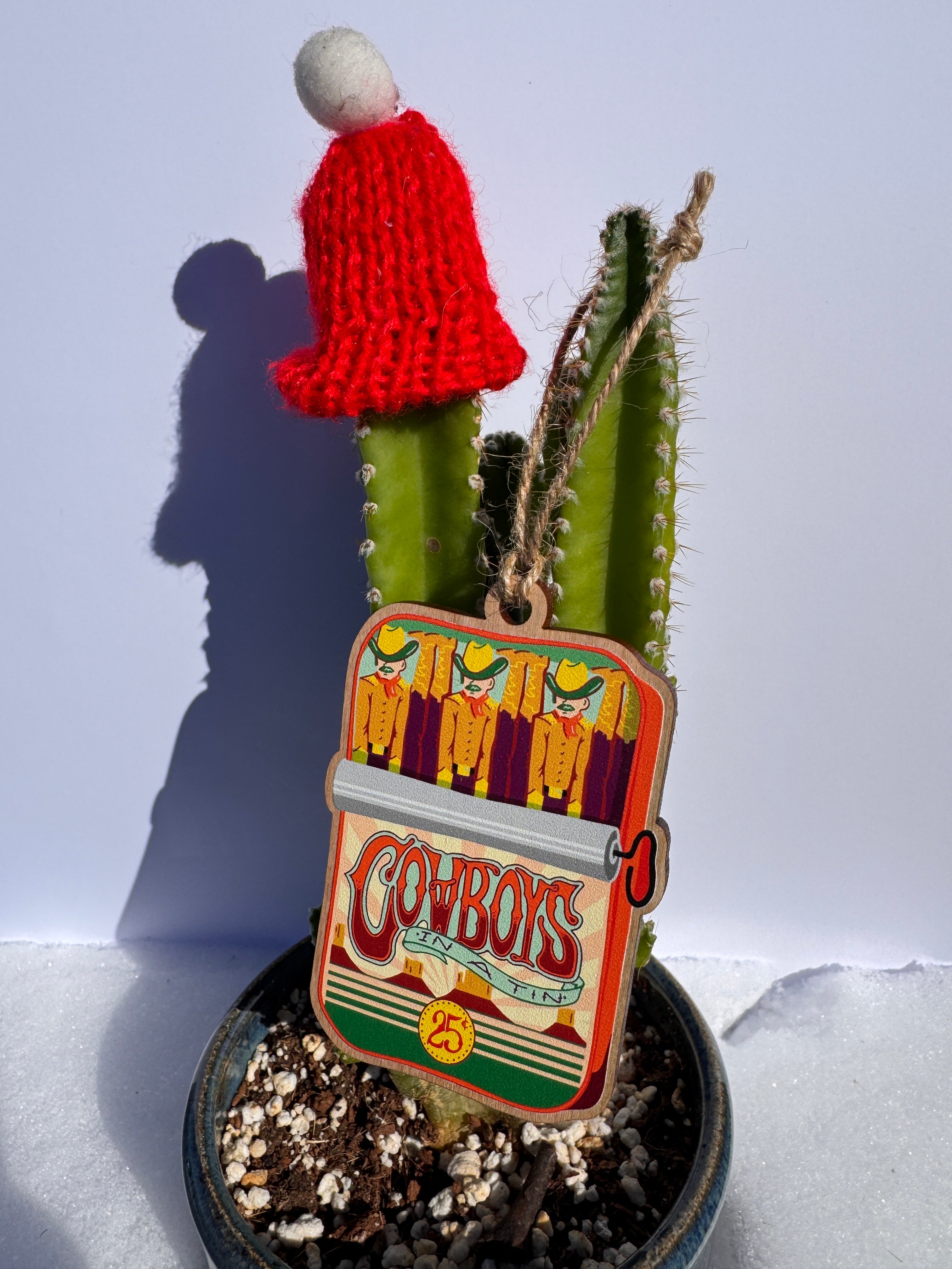 Cowboys in a Tin Ornament