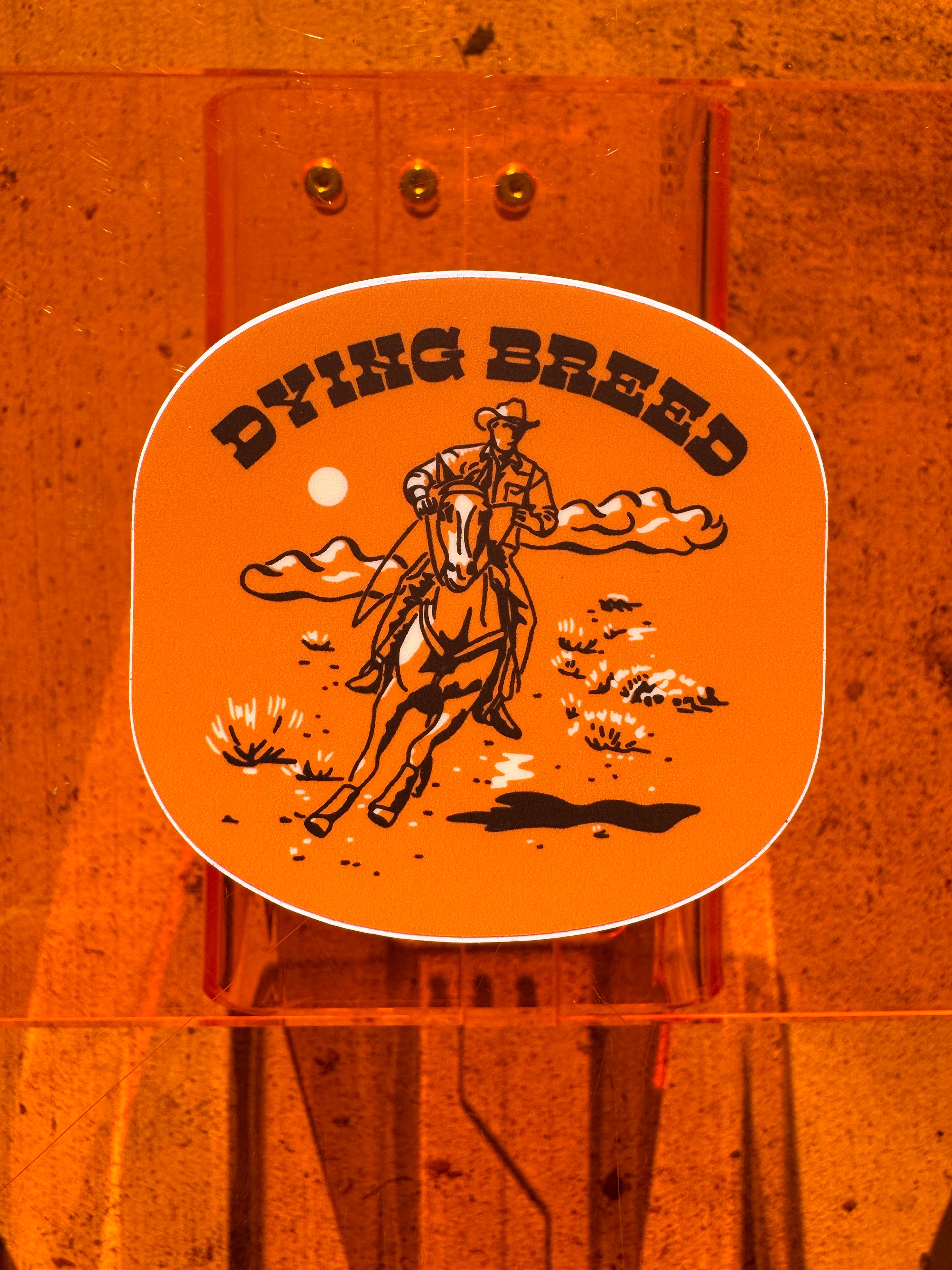 Dying Breed Orange Cowboy Sticker