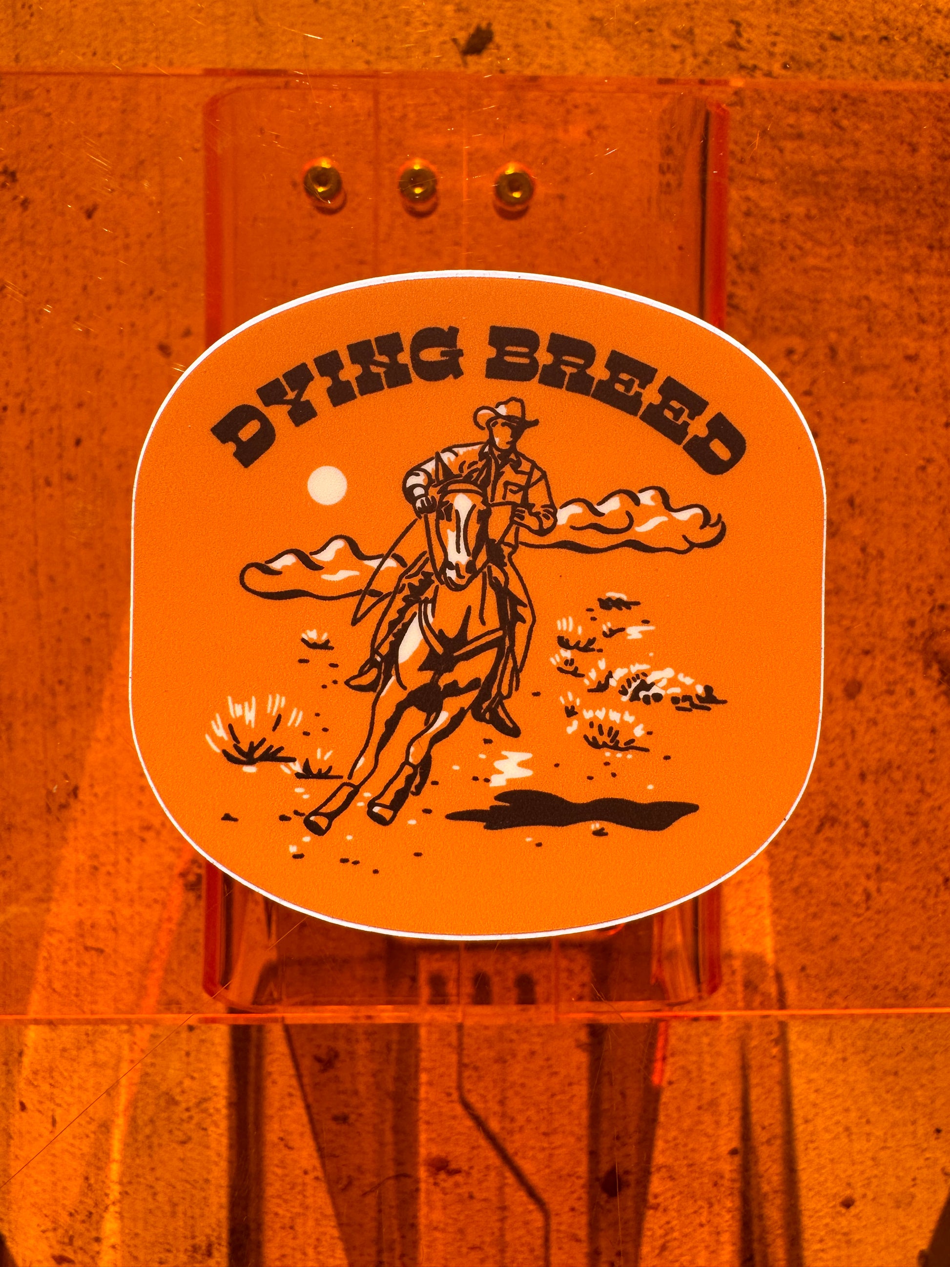 Dying Breed Orange Cowboy Sticker