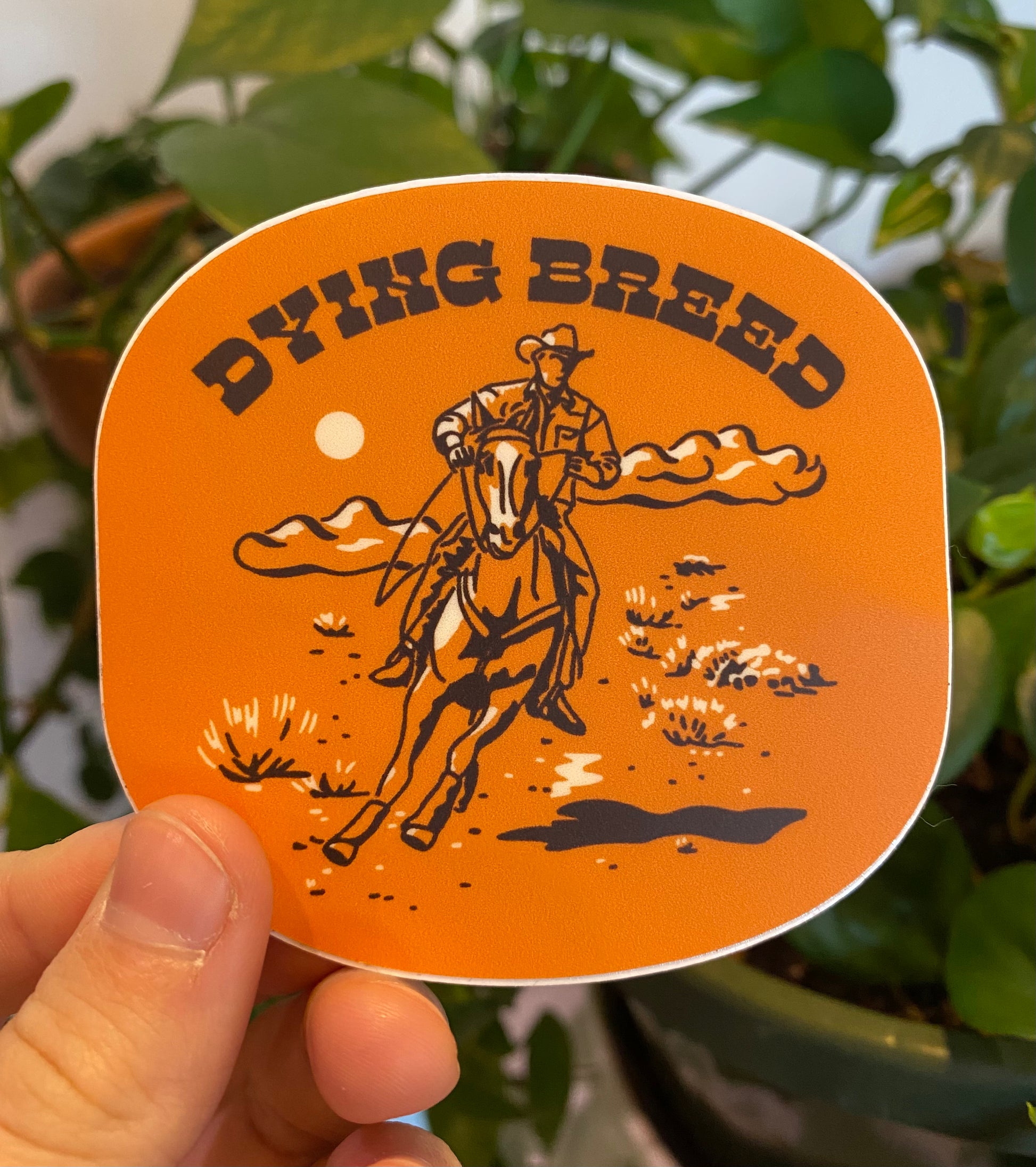 Dying Breed Orange Cowboy Sticker